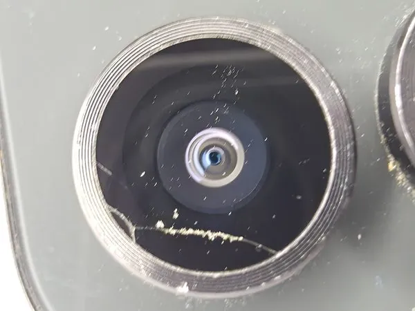 Samsung Galaxy S23 FE camera lens crack close-up