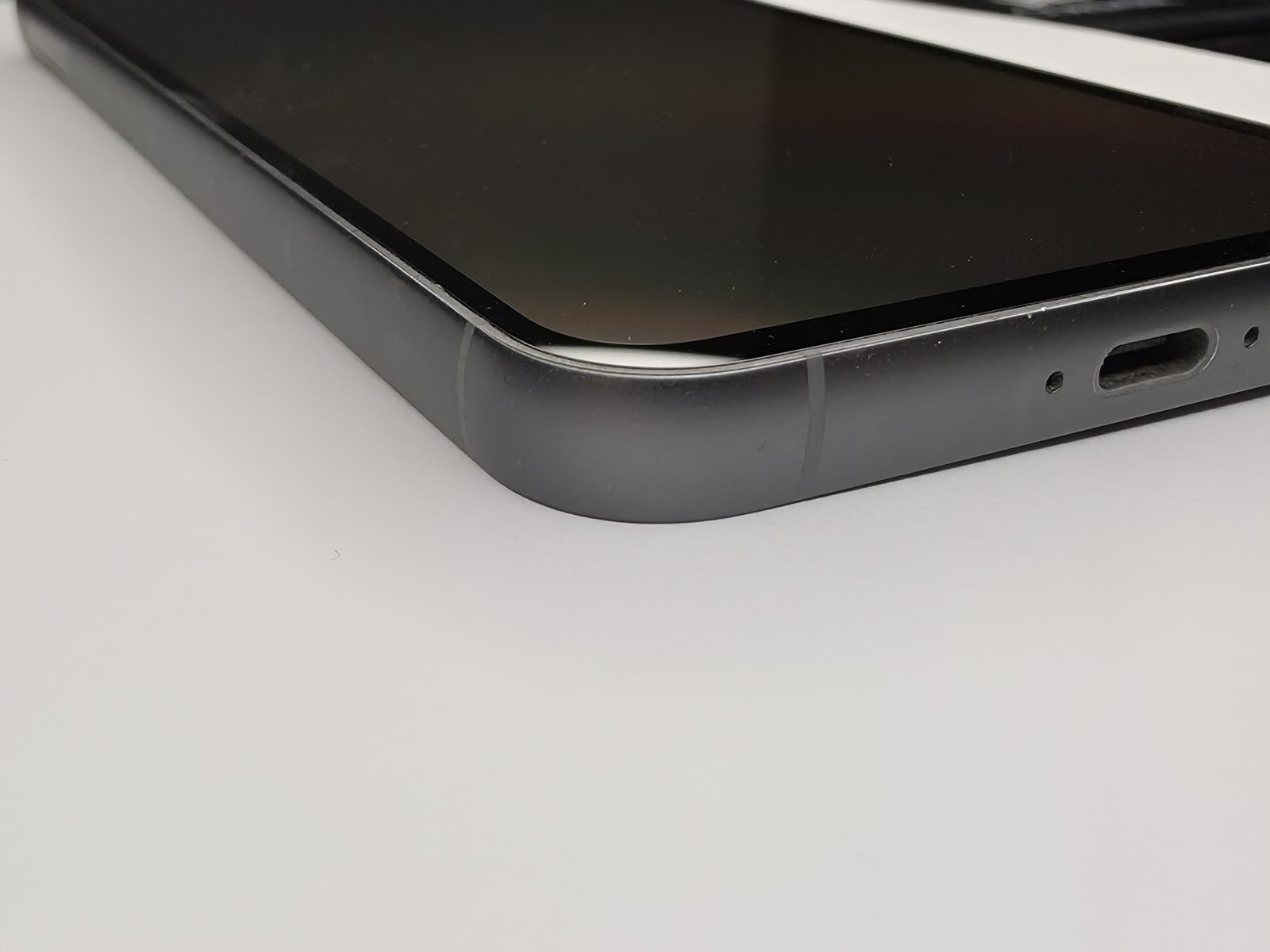 Samsung Galaxy S23 FE top corner close-up